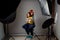 Photographing children in professional photo studio withÂ lighting equipment